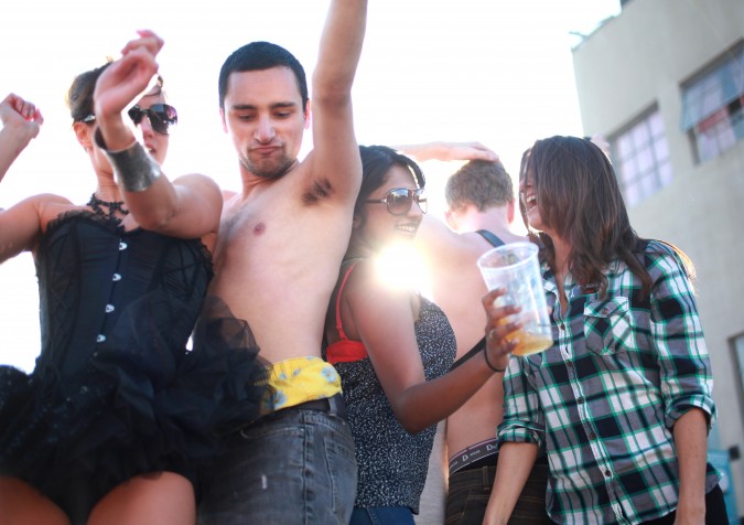 San Francisco Folsom Street Fair, September 23, 2012. Group dancing in the Sun.