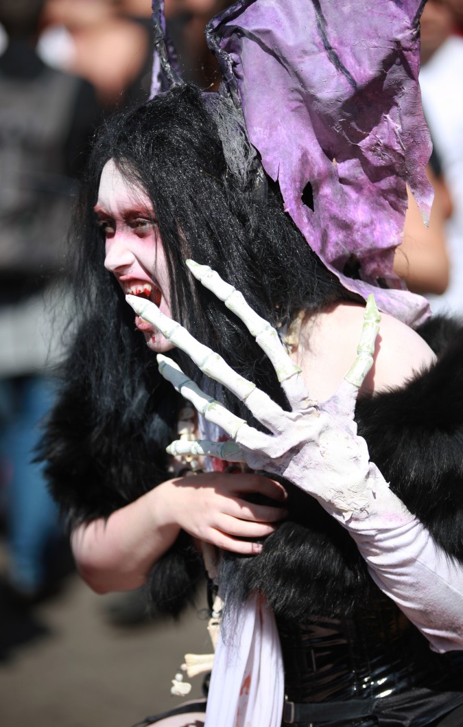 Woman with bloody teeth at the San Francisco Folsom Street Fair, September 23, 2012. 