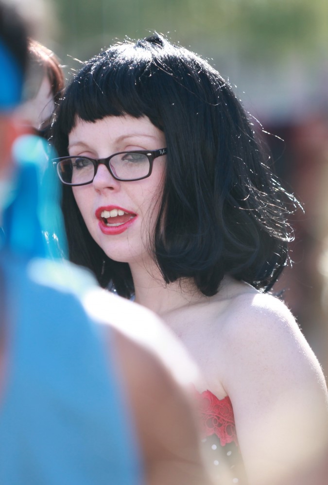 Woman with jet black hair at the San Francisco Folsom Street Fair, September 23, 2012. 